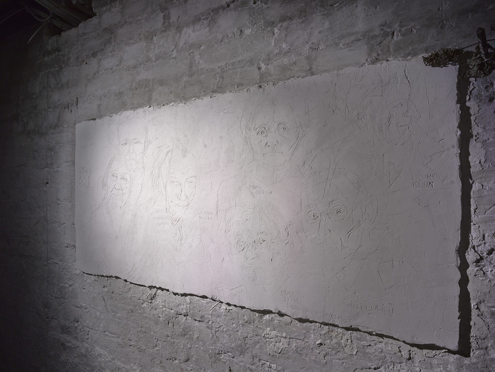 Plaster Wall Relief, Photo Harry Weber. The artist Julia Sand made this plaster wall relief in the year 1995 on the occasion of the exhibition „SA Prison Papestrasse 1933” that was initiated by the History Workshop Papestrasse.